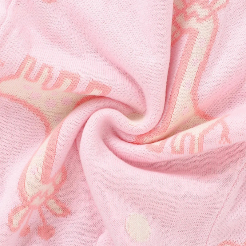 Soft knitted giraffe sweater - warm and playful baby sweater