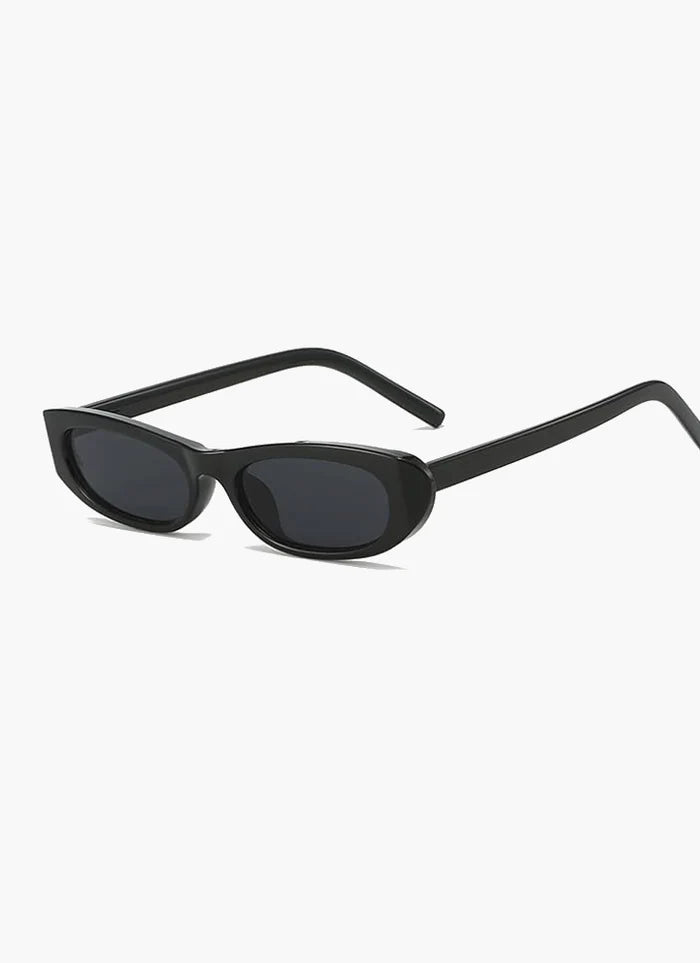 Women's Retro Slim Oval Sunglasses with Bold Frame Design - Designer-Inspired Eyewear