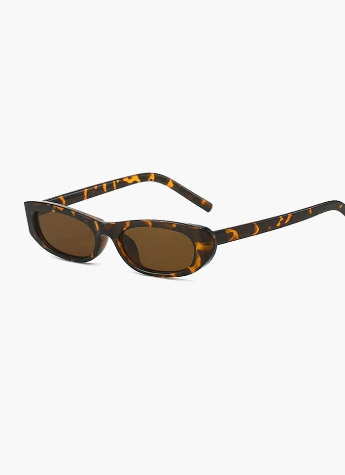 Women's Retro Slim Oval Sunglasses with Bold Frame Design - Designer-Inspired Eyewear